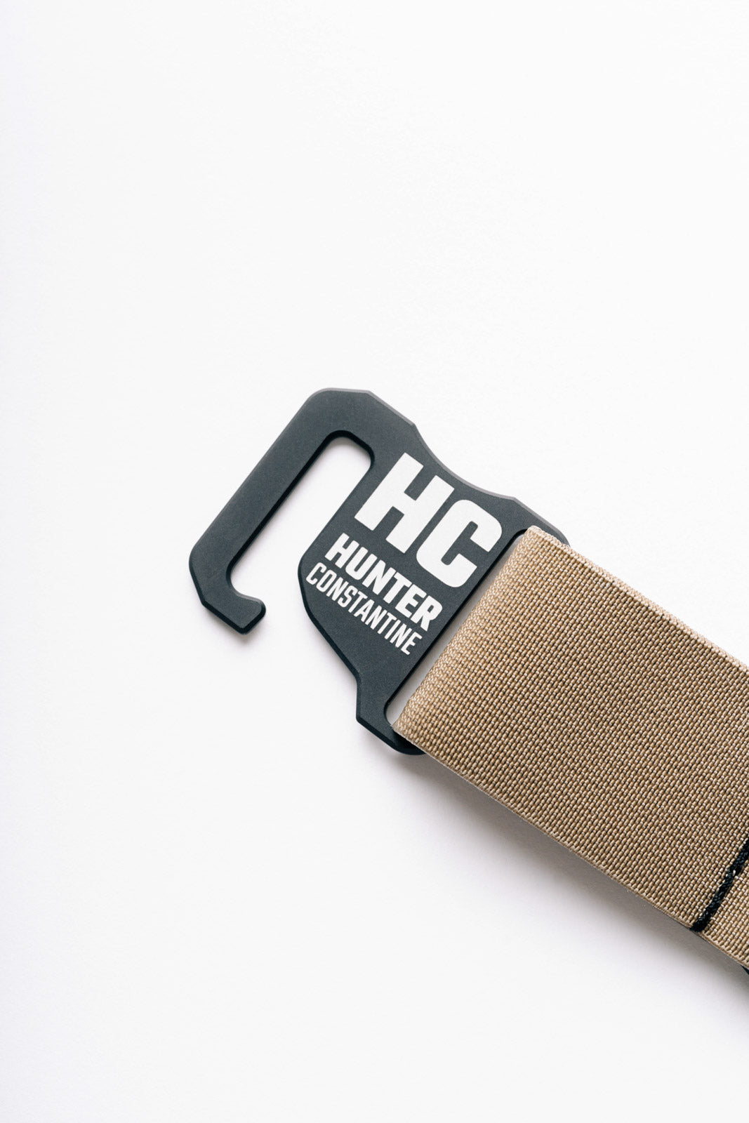 AYCHE Constantine Carry Belt worn by a model, showcasing the stylish black apparel belt with a sleek buckle design.