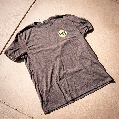 AYCHE REAL GOOD BELTS TEE with faded logo, casual apparel in soft fabric featuring a stylish logo design.