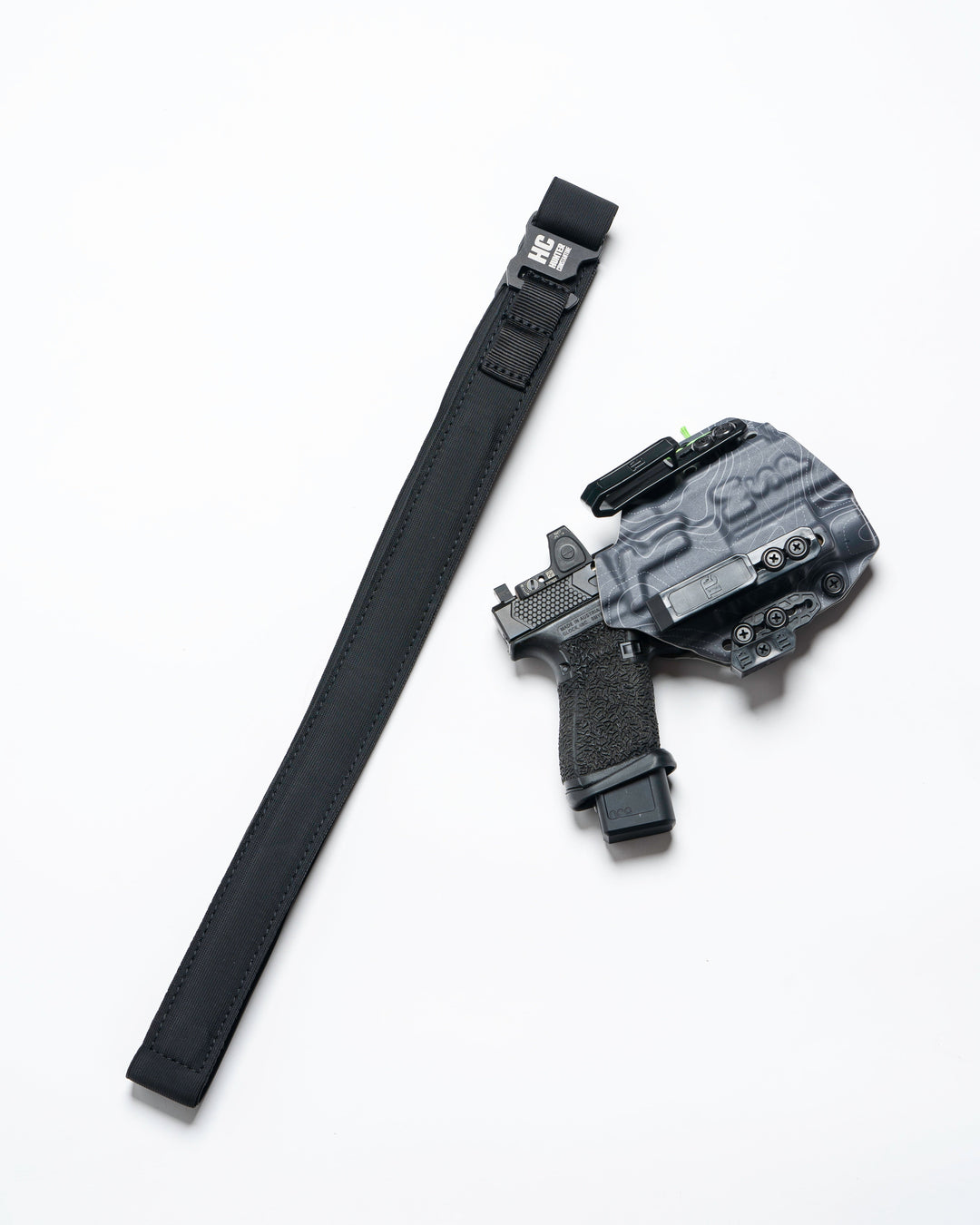 Black AYCHE BLEM Constantine Carry Belt™ worn around waist, showcasing durable apparel belt with adjustable strap and metal buckle.