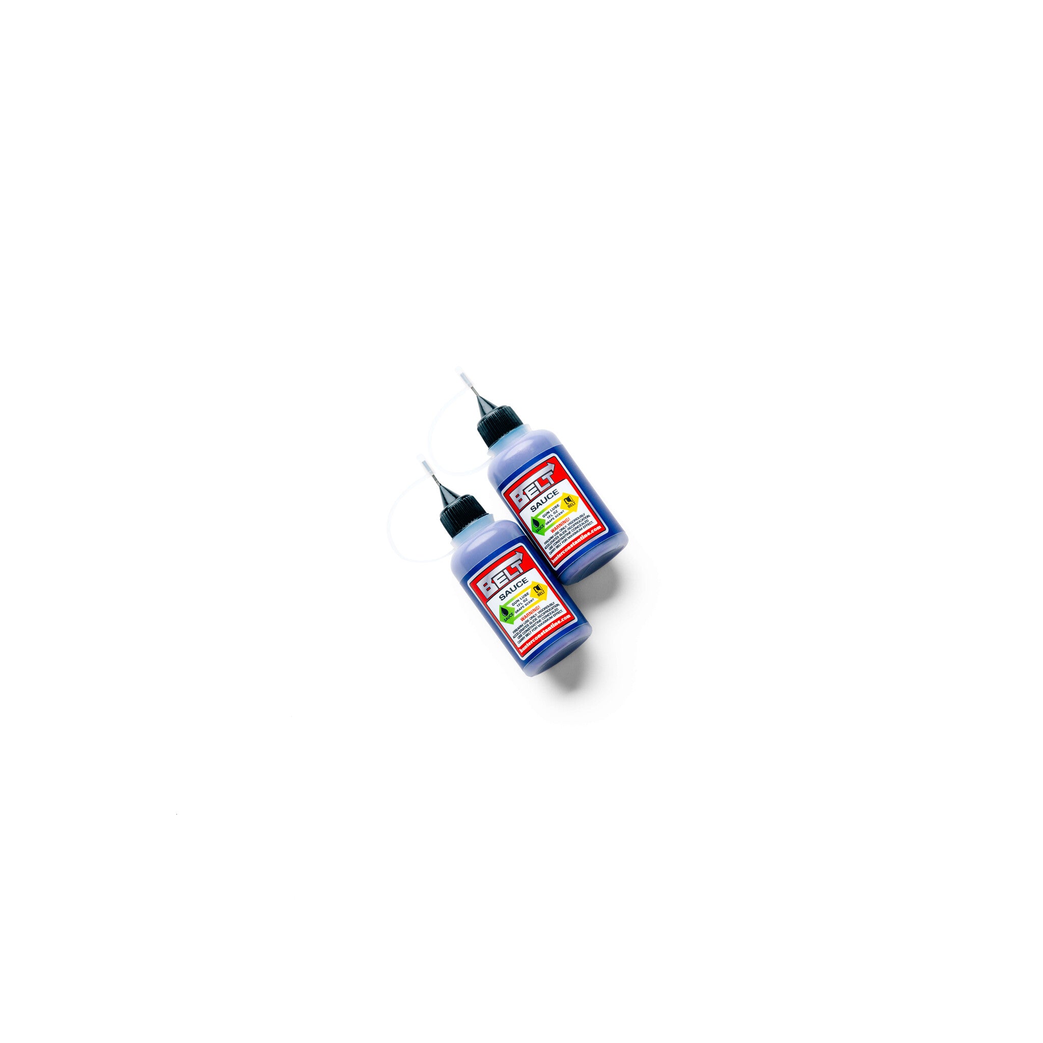 A bottle of Hunter Constantine Belt Sauce with a colorful label, positioned on a wooden surface, showcasing its spicy sauce appearance.
