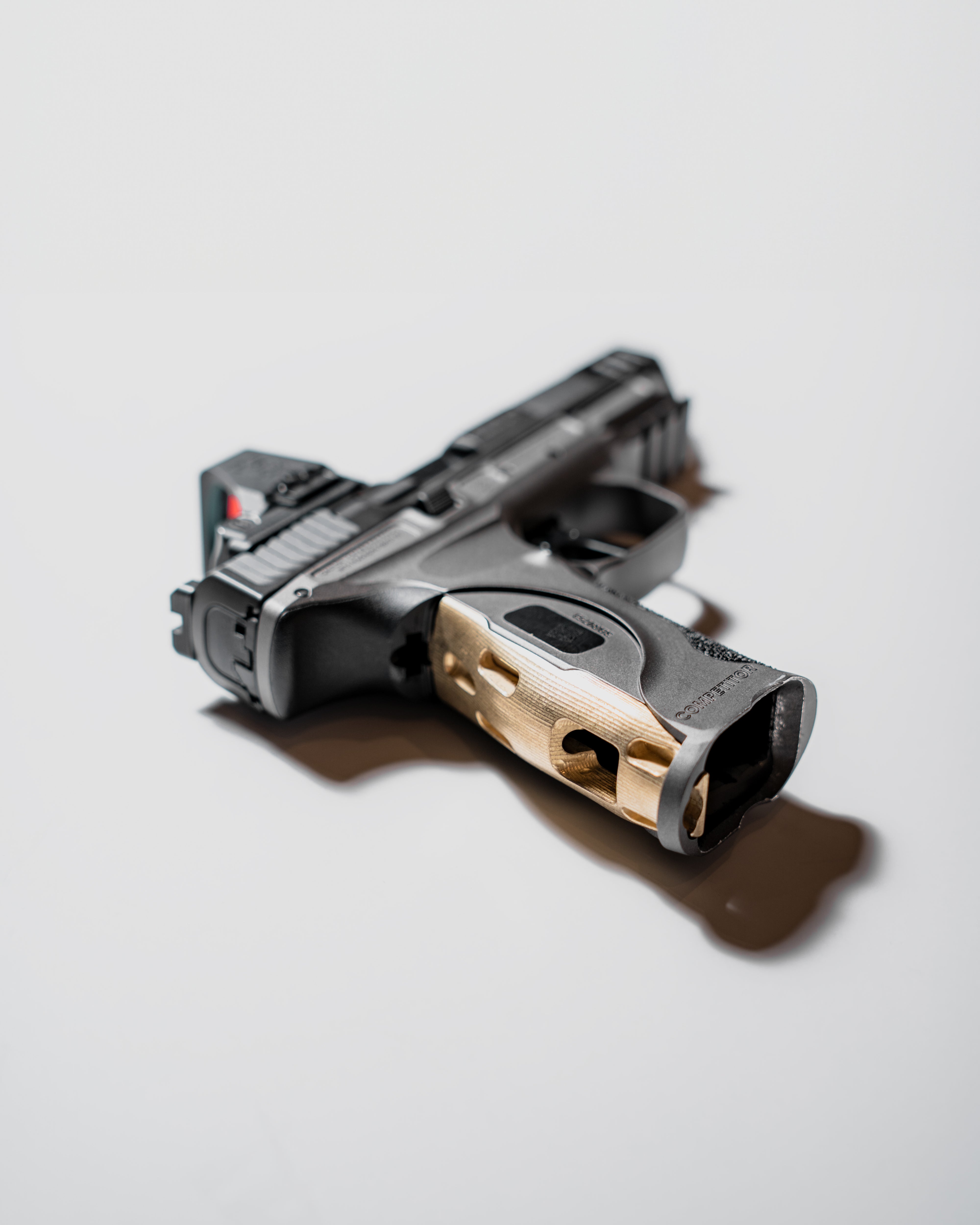 AYCHE Blem S&W M&P9 metal brass grip panel for handgun hardware, showcasing textured surface and brass finish.