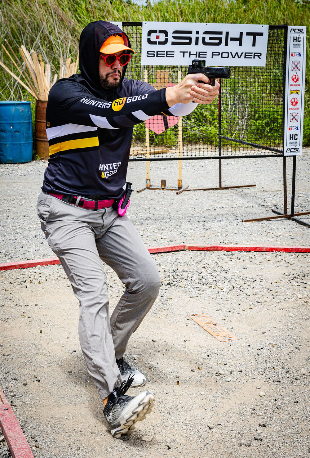 A competitor in a Hunter Constantine hoodie fires from a shooting position at the 2026 BELT championship