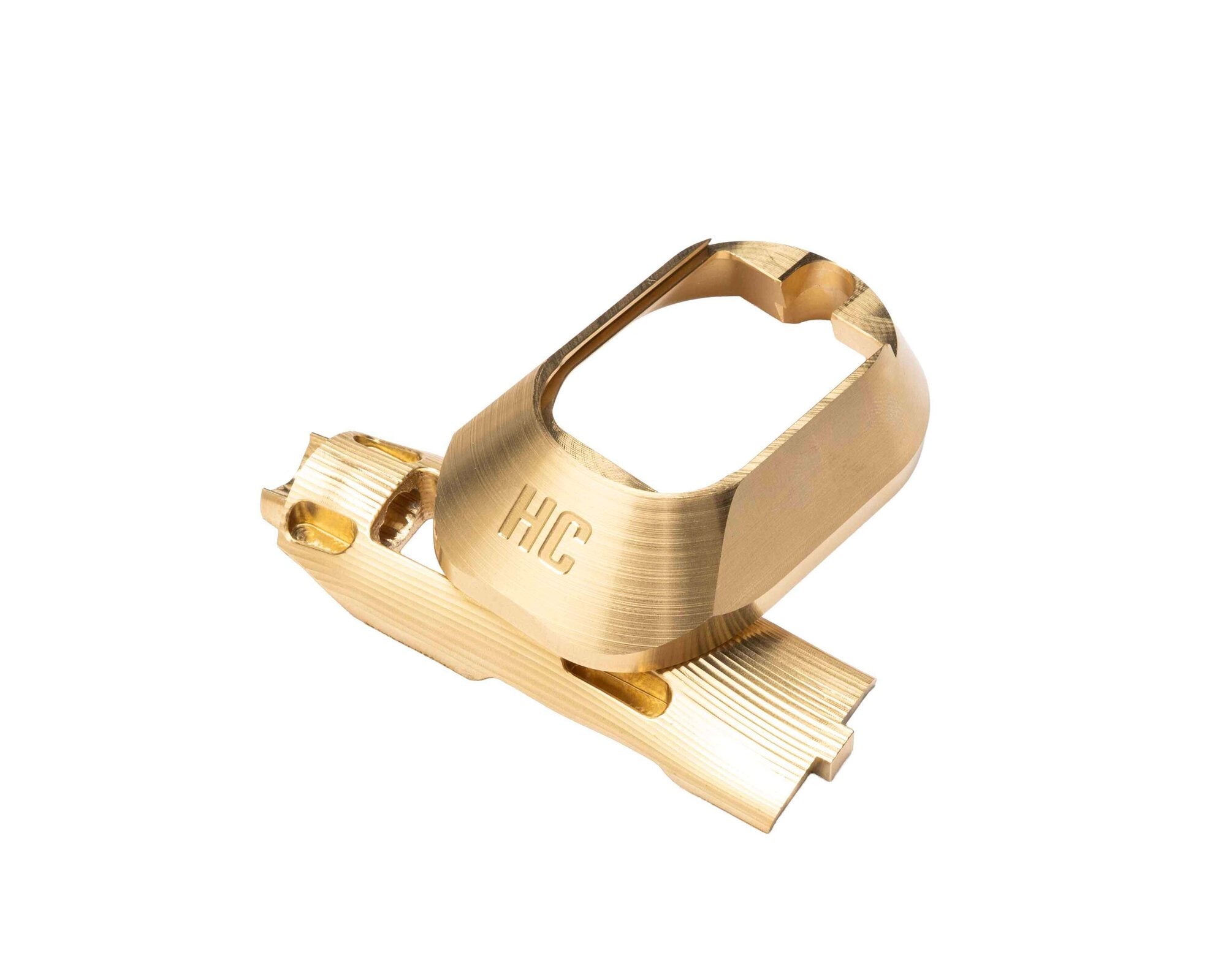 Brass M&P grip insert, magwell, and magwell pin included in the serialized combo