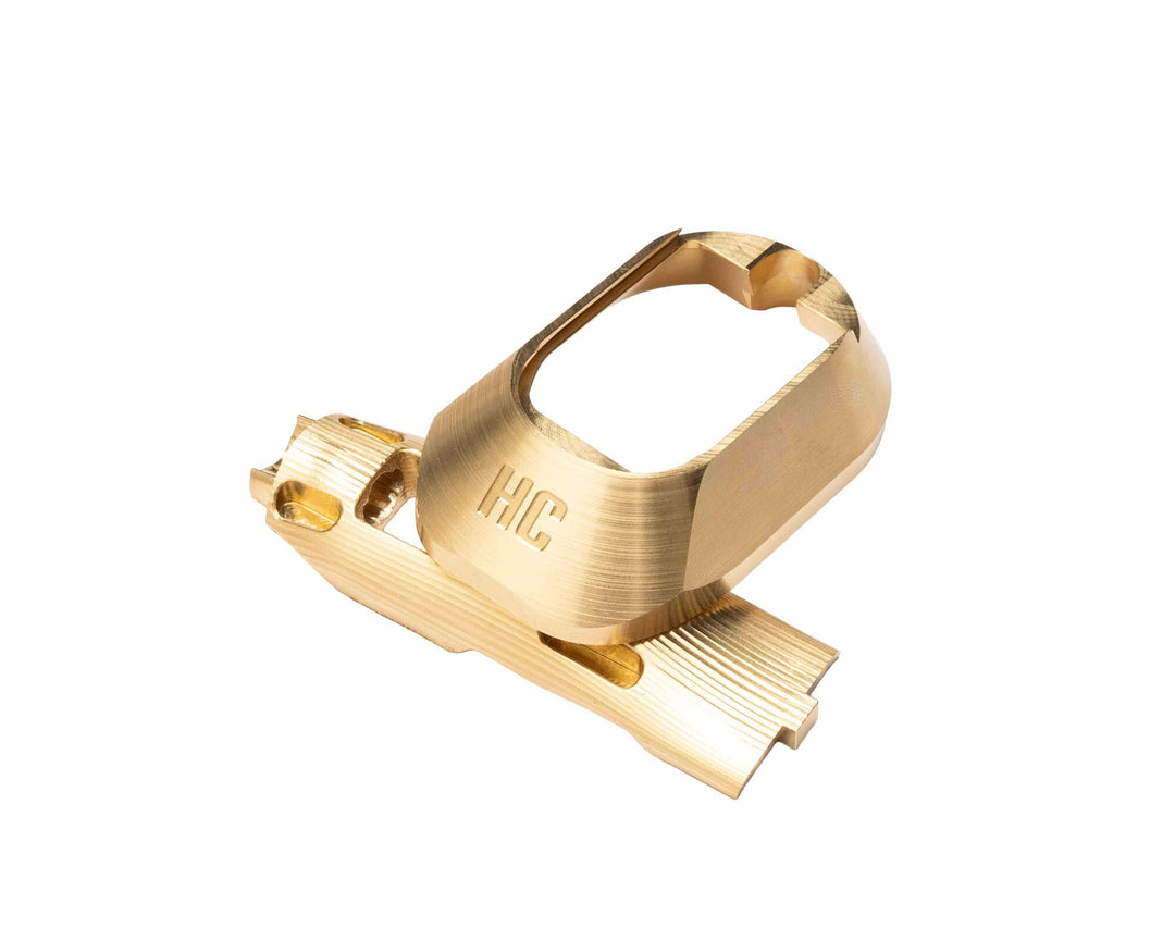 Brass M&P grip insert, magwell, and magwell pin included in the serialized combo